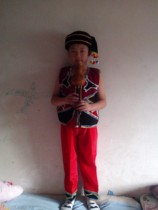  New childrens ethnic minority Wa clothing gourd silk performance dance performance clothing Yi stage performance clothing