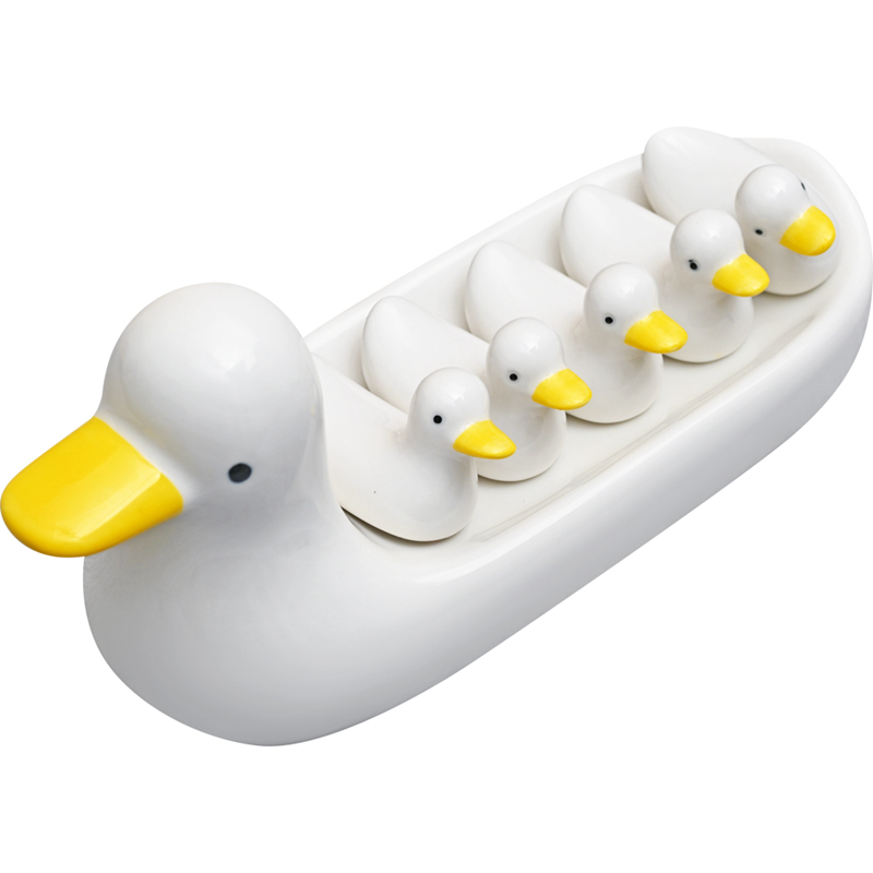 Creative hand - made ceramic white suit cartoon express chopsticks holder frame duck chopsticks chopsticks pillow small place