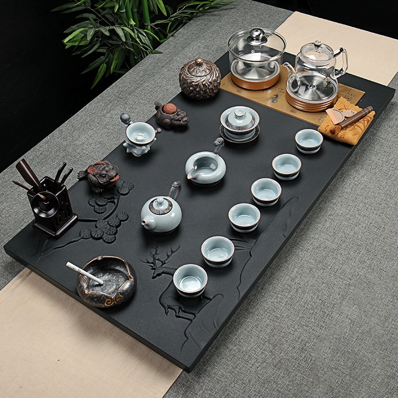Qiao mu sharply stone tea tray table violet arenaceous kung fu tea sets tea cups of a complete set of automatic glass four one household