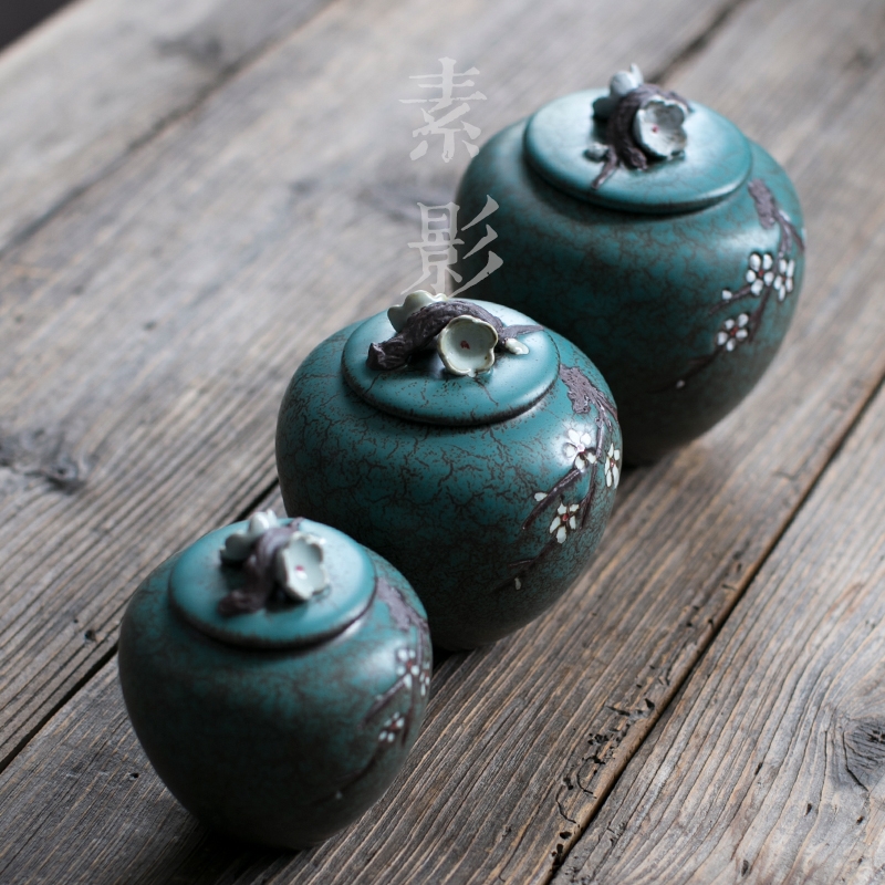 Qiao mu medium, hand - made name plum flower tea pot ceramic seal hand - made tea warehouse Chinese style household storage tanks