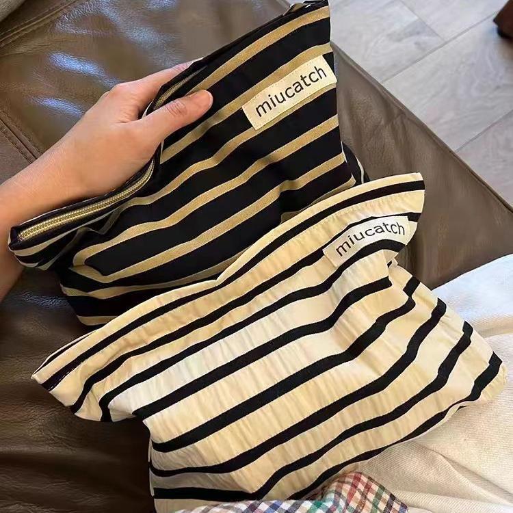 Travel Striped Black and Gold Skincare Product Storage Bag, Simple and Elegant Makeup Bag, Portable Japanese Style ins Handheld