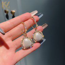 Pearl earrings 2021 New Tide goddess fan temperament earrings sterling silver senior sense light luxury French retro earrings