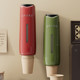Disposable cup picker wall-mounted