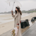 Áo gió cô gái trung dài over-the-đầu gối ins trăm mới phiên bản Hàn Quốc của lỏng áo khoác cổ điển khí đeo áo thời trang 