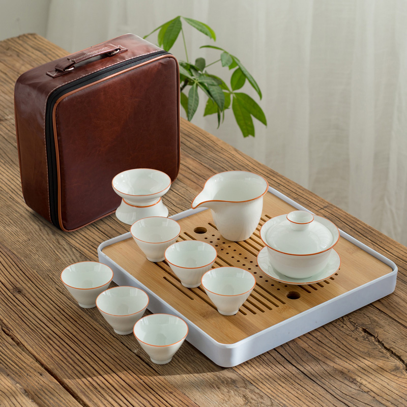 Poly real (sheng hand - made dehua white porcelain kung fu tea set suit small household contracted and I tea tray sets of portable travel bag