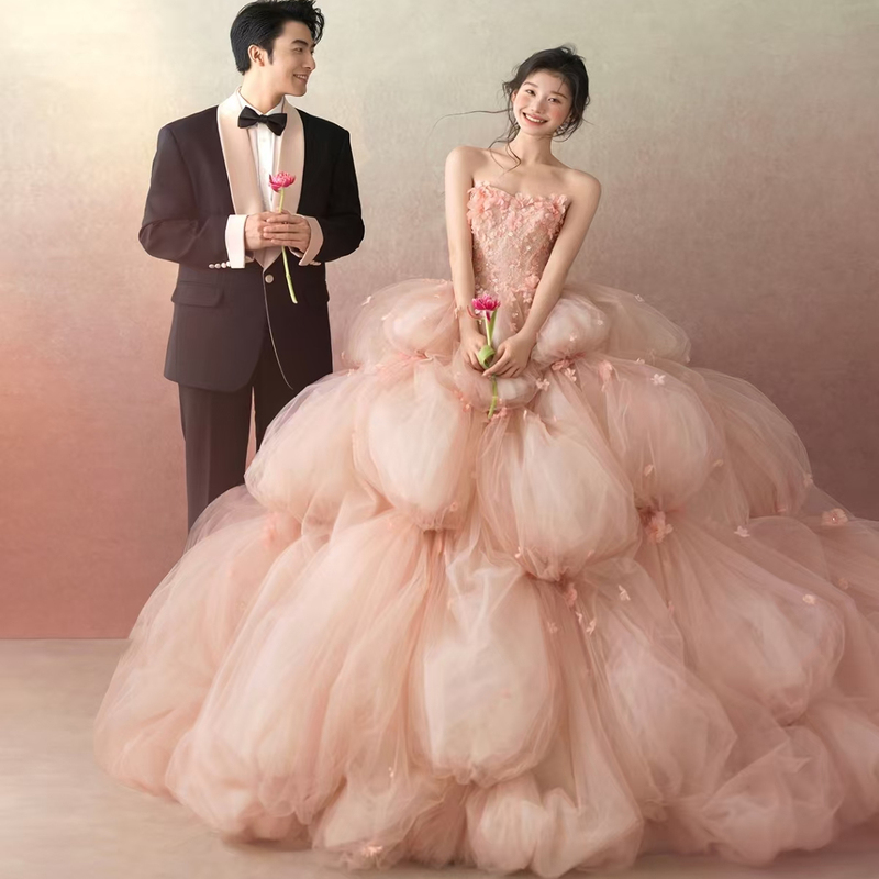 Photo Studio Theme Couple Photoshoot Outfit with a Simple and Sweet Atmosphere, Pink Flower Goddess Strapless Trailing Wedding Dress