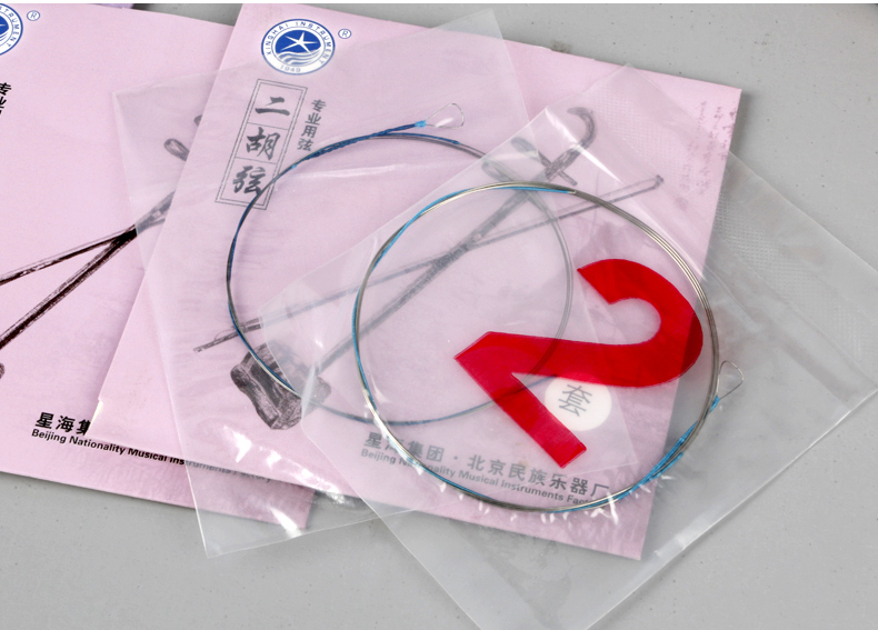 Xinghai chuyên nghiệp đàn nhị dây chuỗi ngoài chuỗi cao cấp đàn dây đàn nhị erhu phụ kiện dụng cụ các dây đàn guitar