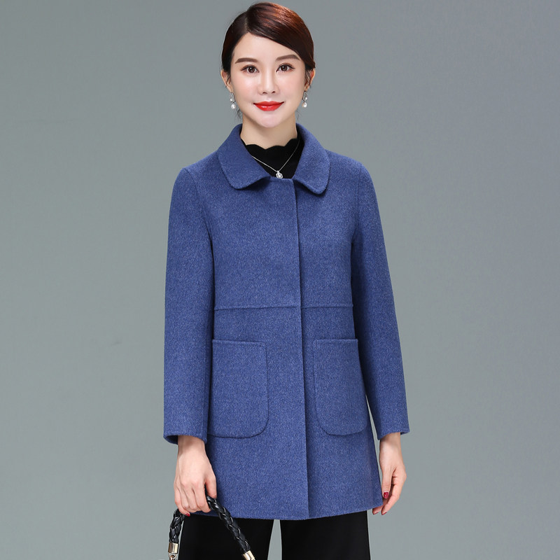 Middle - aged mother with double - sided coat in the long 100 % wool coat