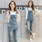 Phiên bản Hàn Quốc của quần yếm denim lỗ quần nữ chín quần Quần dài phong cách Harajuku rộng lớn đại học dây gió jumpsuit quần