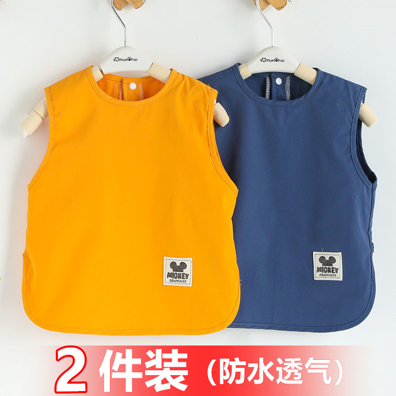 Anti-stain bib for baby wearing inside out while eating