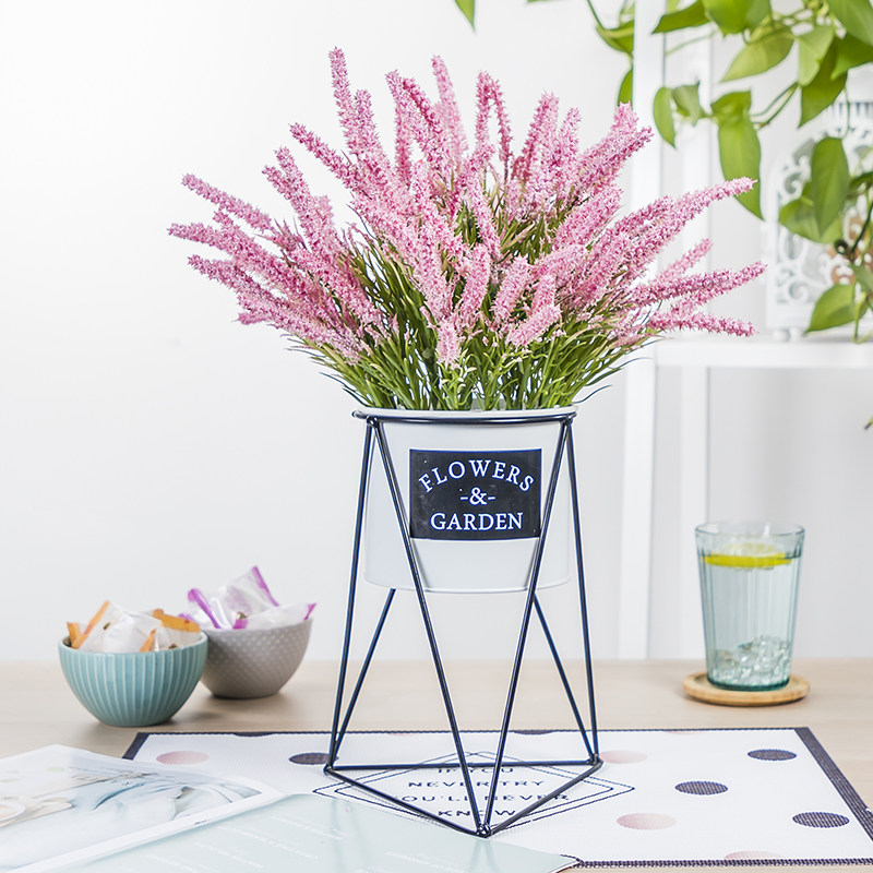 The coffee table next to the living room fake flower TV set the decoration on both sides of the flower simulation rose sun TV cabinet