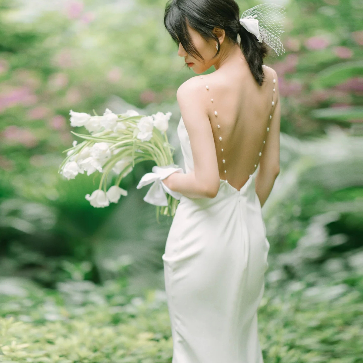 Simple sling light wedding dress 2023 new French satin slim fishtail temperament bride Mori travel shoot out door yarn