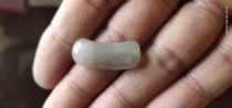  One of the jade saddle ring faces