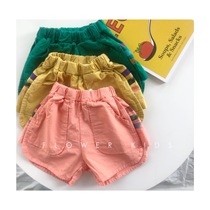 Spot Korean childrens clothing summer aloha Boys and Girls big pocket stitching side horizontal bar loose casual shorts