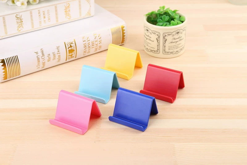 Điện thoại di động lười biếng để bàn đứng dễ thương nhỏ nhựa tươi đơn giản cầm tay gấp nhà sáng tạo điện thoại di động - Phụ kiện điện thoại di động