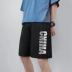 Mùa hè mặc quần short tập thể dục nam thương hiệu in lưới đỏ quần năm điểm giữa thể thao lỏng lẻo xu hướng bảo vệ quần - Quần short