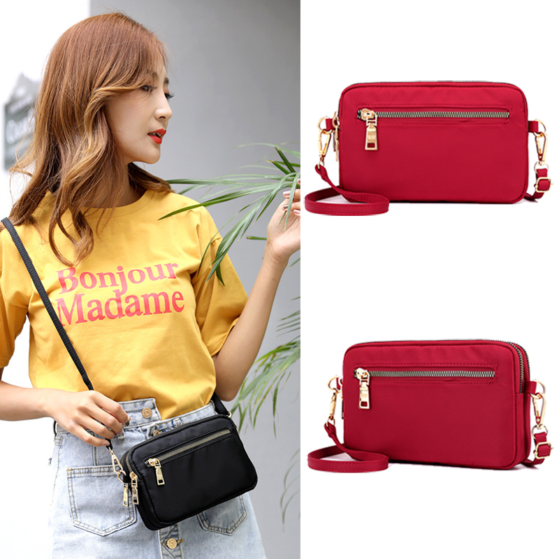 2021 new women's messenger bag hand bag carrying canvas mini bag Korean coin purse shopping light