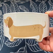 Export ceramic Pet Bowl cartoon sausage high feet increase drinking water eating cat and dog food basin anti-black chin spilled