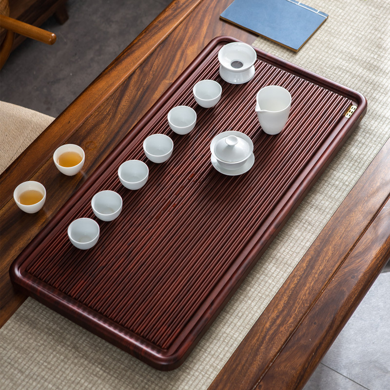 Tea tray solid wood whole piece simple home Japanese tea sea drainage large and small stone tea table kung fu tea set rosewood color