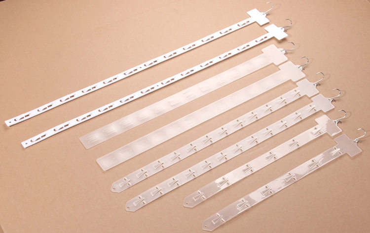 Supermarket shelves hooked snacks hung on the convenience store cash checkout counter small snack shelves plastic food hung display frame