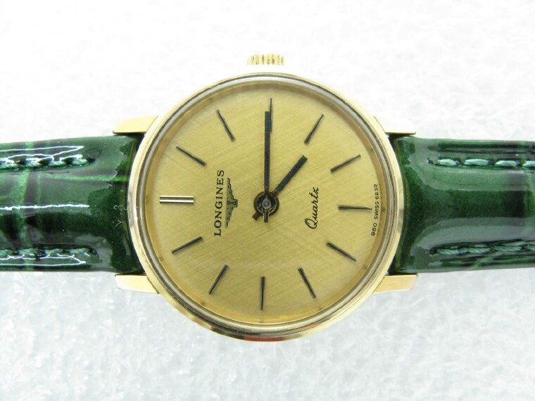 vintage grid dial daughter of the Bag Golden Wave in the Ancient Quartz Little Gold Watch