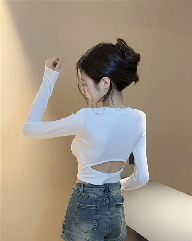 Trendy Backless Long-Sleeve T-Shirt for Women with a Unique Cut-Out Design, Revealing the Belly Button, Suitable as an Inner Layer Trendy Backless Long-Sleeve T-Shirt for Women with a Unique Cut-Out Design, Revealing the Belly Button, Suitable as an Inner Layer