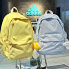 Authentic fake one-for-ten backpacks for male and female students schoolbags