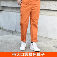 1117 оранжевые брюки с карманами