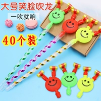 Большое смайливое лицо дует драконское ртувое свисток, дует смайливое лицо клоун, дует детский фестиваль Драконь