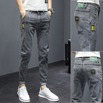 Jeans mens summer thin slim small feet casual long pants Korean trend brand summer elastic versatile