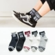 Trong vớ thủy triều nam thể thao Châu Âu và Mỹ vớ cotton tất nam đánh chữ màu trong vớ ống sọc thời trang hoang dã tất vớ