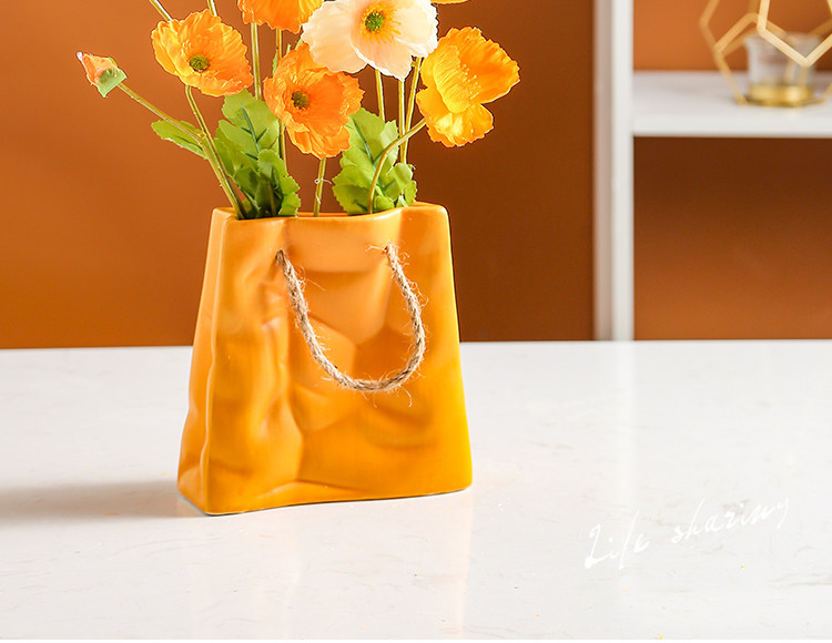 2025新款陶瓷花瓶创意陶瓷包包花瓶摆件客厅插花北欧网红轻奢餐桌干花插花器装饰品花瓶水培花瓶详情2