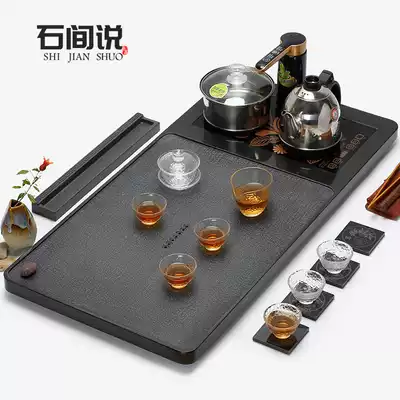 Wujin Stone tea tray set kung fu tea set induction cooker four-in-one automatic household Tea Sea natural stone tea table