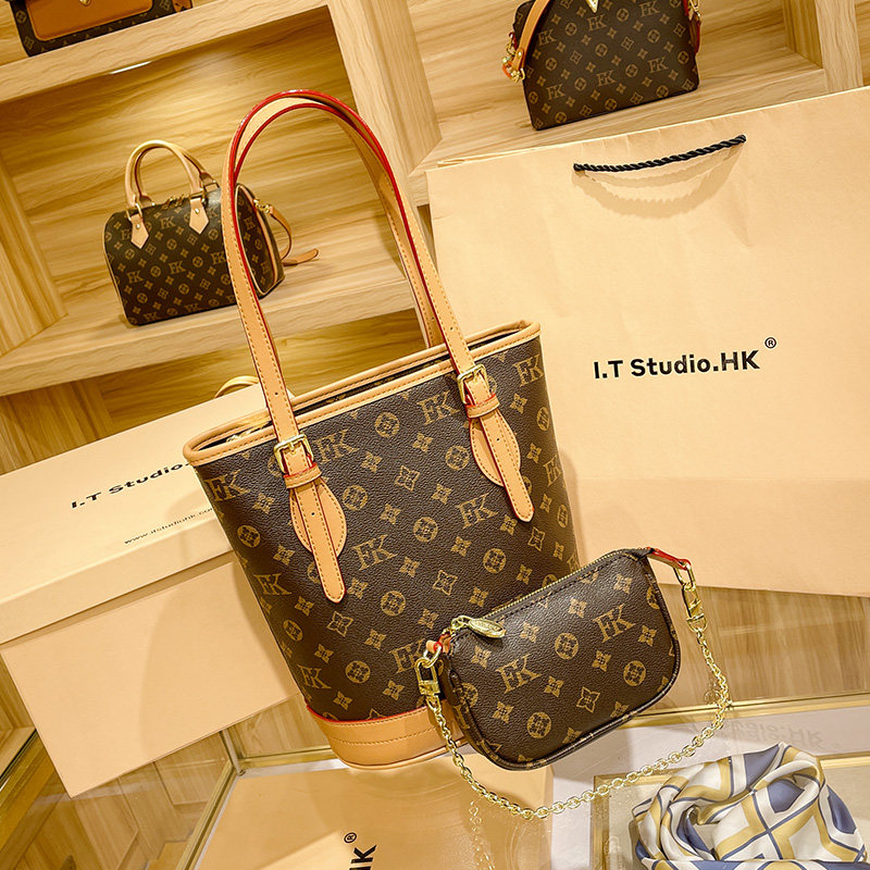 Hong Kong bucket bag women's bag 2022 new trendy autumn and winter leather portable large-capacity shoulder bag tote bag large bag