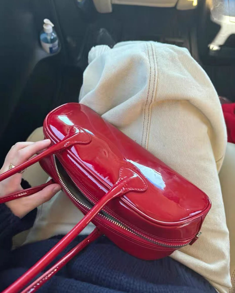 ニッチデザインシングルショルダーオンク同じスタイル高品質脇の下バゲットファッショナブルなパテントレザーレッドハンドバッグ