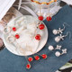 Red artificial pearl earrings 2022 new Korean style trendy temperament long earrings female Korean simple autumn and winter earrings