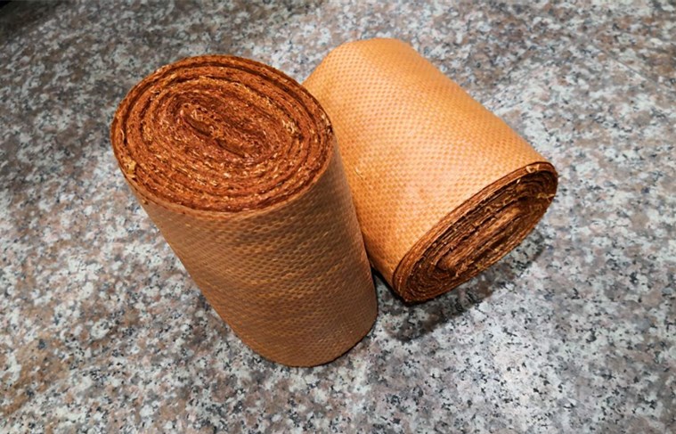 Snake leather bag wound in single layer cloth woven serpent leather roll steel copper material packaging with woven cable iron wire gold orange color