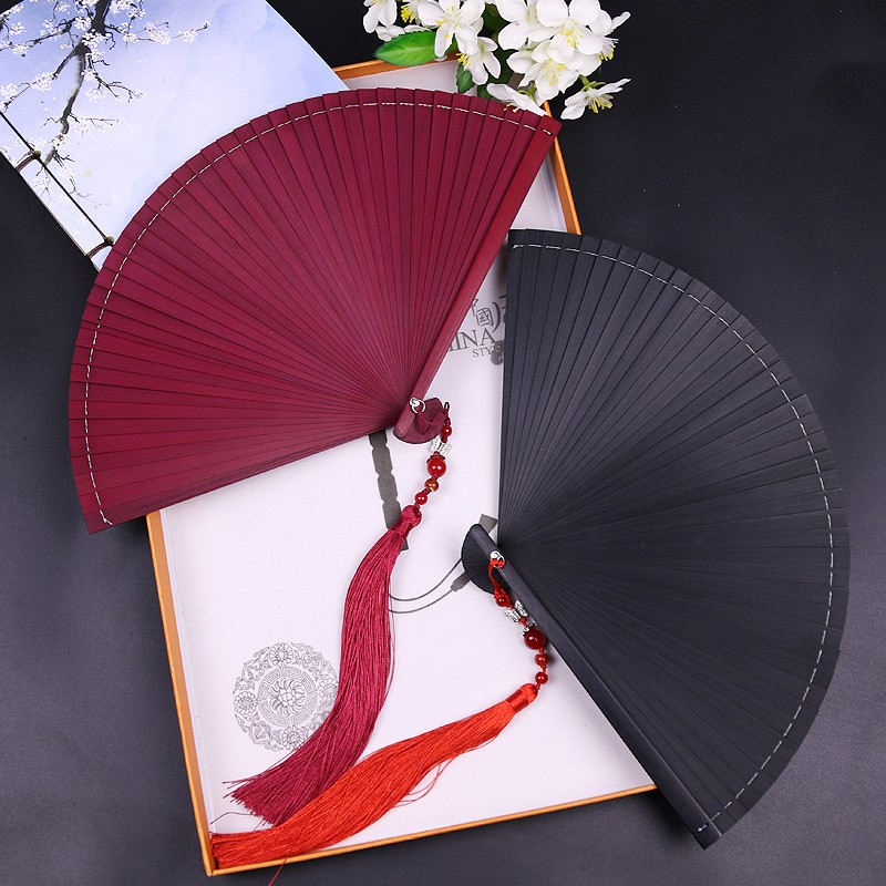 Folding fan Male ancient style jade bone abstinence bamboo fan Retro style jade bone fan Bamboo handmade hollow women's portable national style