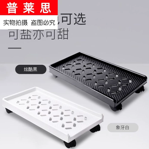 Небольшая полка хранения дно держит в шарнирной столовой столовой столешнице.