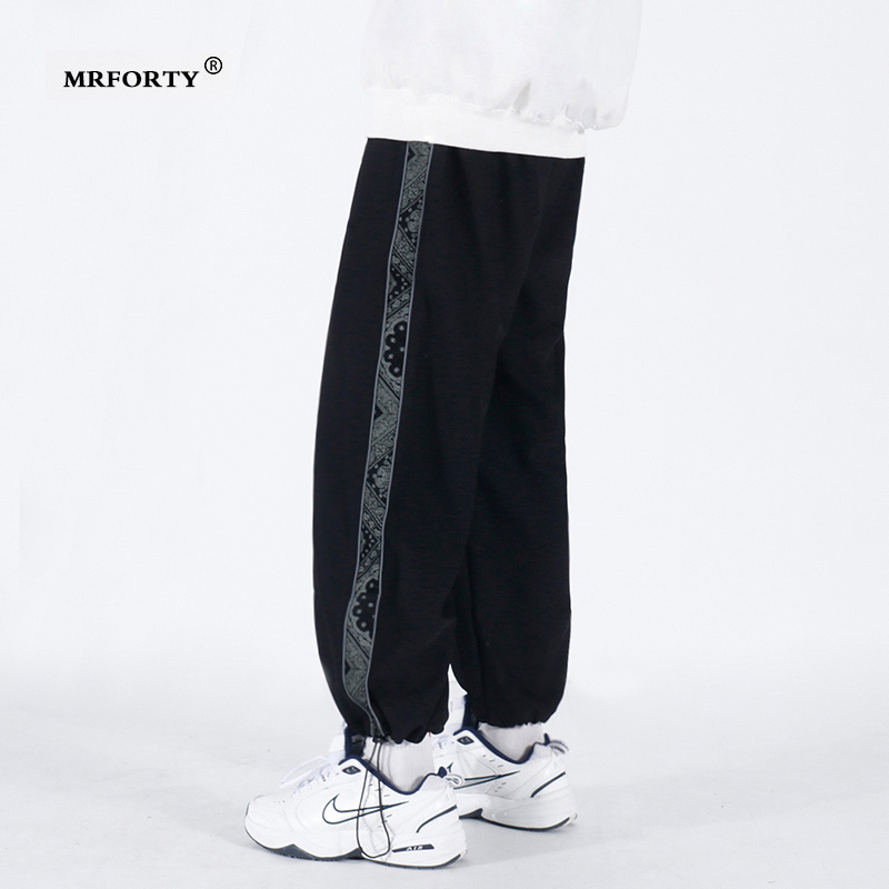 Mr forty spring and autumn new cashew flower pants men's loose trend drawstring trousers Korean version of casual pants