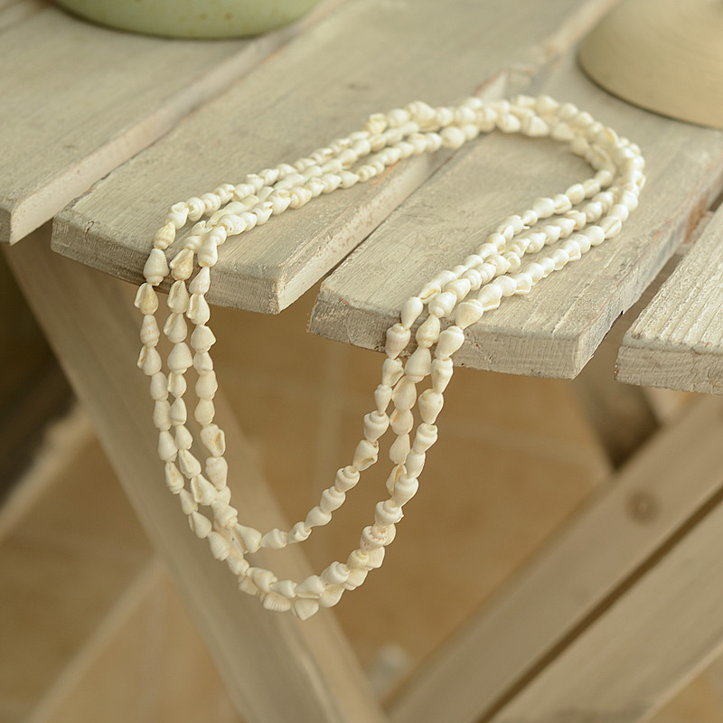 Literary fresh European and American multi-layer natural shell necklace women Japanese and Korean fashion long seaside sweater chain spring and summer all-match