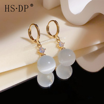 Summer new sweet and high-end temperament cats eye stone ear buckle womens niche design literary and artistic clear fashion earrings