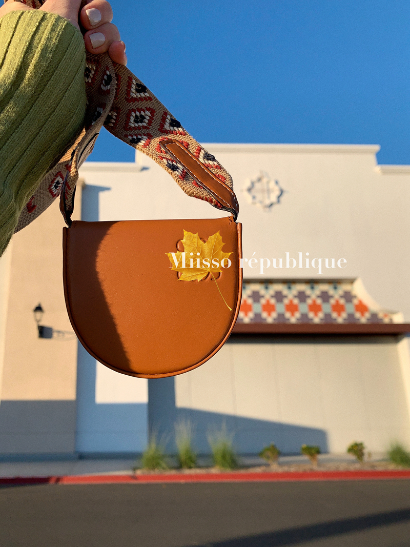 It can only be loaded with a cute little small bag.