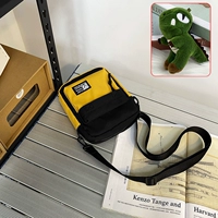 Черно-желтый динозавр, подвеска