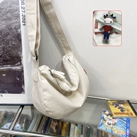 Белый+подвеска в виде коровы в детской сумке