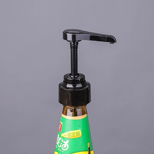 Устричный соус бутылка с прессованием масляной бутылки. Сжимайте домашнее потребление топлива, нажмите рот, чтобы сжать устричный соус, количественный насос с ингредиентом нака