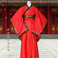 Темно -полосатая золотая красная юбка в красной куртке