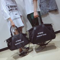 Large capacity one shoulder oblique cross travel bag womens portable waterproof sports bag mens short-distance business trip luggage bag fitness bag tide