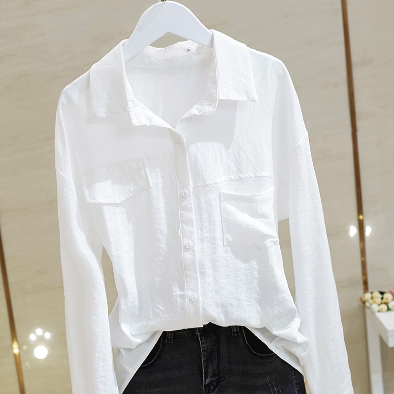 Cotton and linen white long-sleeved shirt women's design sense niche loose 2021 Korean version of the new pocket slim slim shirt