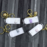 Плавающая свиная линия торговля ключом Ключевой цепь Перегающая песчаная бутылка с масляной свинью, молочной свинью, свининой, кремовой бутылкой дуйин